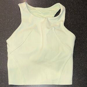 Women's lululemon cropped tank. Size 0 no tags. Color is light lime.